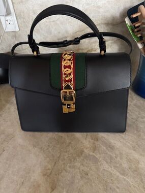 Gucci Black Top-Handle Satchel with Green and Red Stripe & Gold Chain.